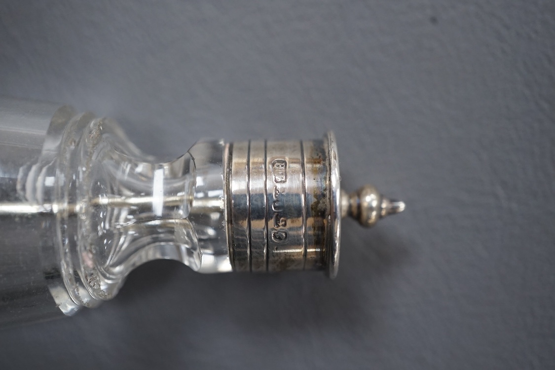 An Edwardian silver candle snuffer, possible Goldsmiths & Silversmiths Co Ltd, London, 1909, 29.9cm, a Victorian silver mounted glass cayenne pepper jar and white metal(tests as silver) menu holder, with Prince of Wales